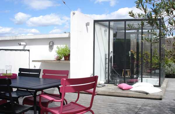 Transformation d'un toit en terrasse végétalisée style Loft par un architece paysagiste à Tours