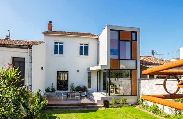 Conception et réalisation d'une extension dans une maison de ville par un architecte à Tours