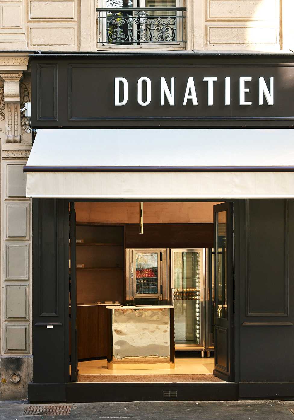 Façade d'une boutique après travaux de rénovation par un architecte in Tours